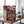 Big Brand Originals Beef Jerky Mixed Pack på en benk på treningssenteret, med manualer, håndkle og drikkeflaske i bakgrunnen, AI-generert bilde