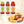 Tre Hela Curry Spice Ketchup-flasker, mild, extra hot og original, ved siden av burger, pommes og pølse