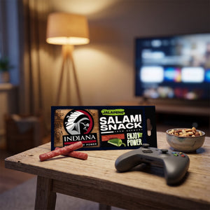 Indiana Salami Jalapeno på stuebordet en kveld, med spillkontroll og en liten skål, AI-generert bilde