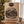Jack Link's Beef Jerky Julekalender på et bord ved juletreet, med kakao og pepperkaker, AI-generert bilde