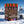 Jack Link's Beef Jerky Mix i snøen ved siden av turski og staver på en solrik vinterdag i fjellet, AI-generert bilde