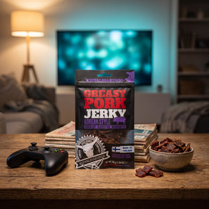 Kuivalihakundi Greasy Pork Jerky Koreansk Stil på stuebordet en kveld, med spillkontroll og en liten skål, AI-generert bilde